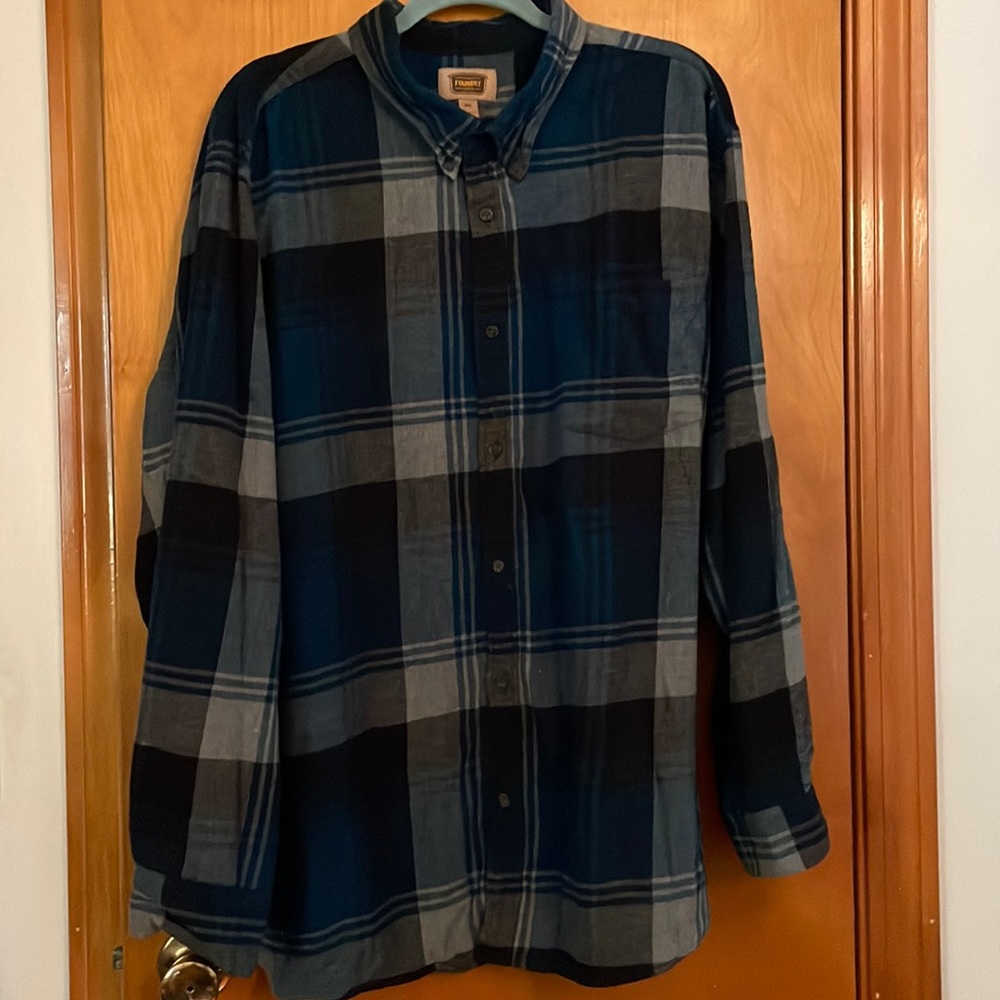 Blue plaid button down shirt with left front pocket
